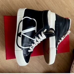 Valentino High top sneakers...Warm and comfortable... extra new laces